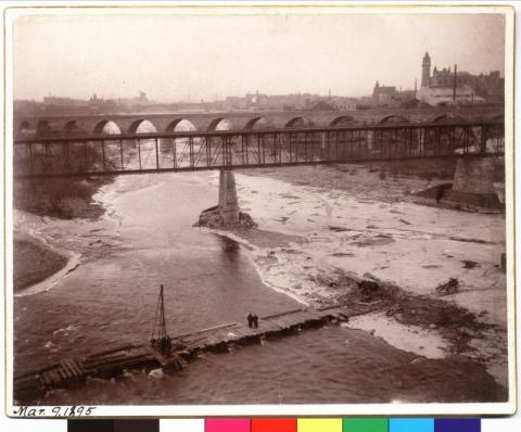 St. Anthony Falls milling district with trestle bridge and Stone Arch Bridge, Minneapolis, Minnesota