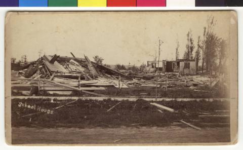 View showing a large pile of lumber that was once Northrop School, Rochester, Minnesota