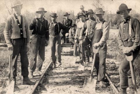 Railroad crew laying track, Thief River Falls, Minnesota