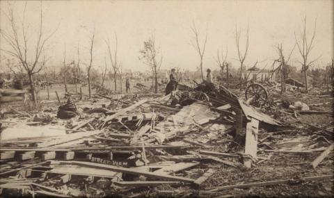 People viewing the damage after the tornado